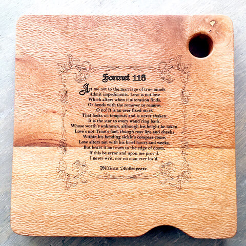 engraved sonnet on wooden board
